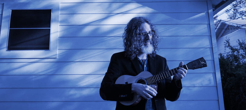 Kevin Carrol performing ukulele