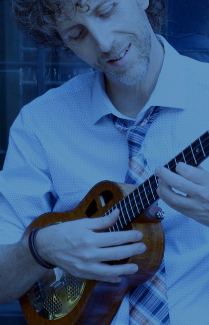 Kevin Carrol performing ukulele